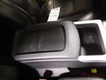 2014 Nissan Titan Center Consold Lid Only Black. Fixed Price $115.00.